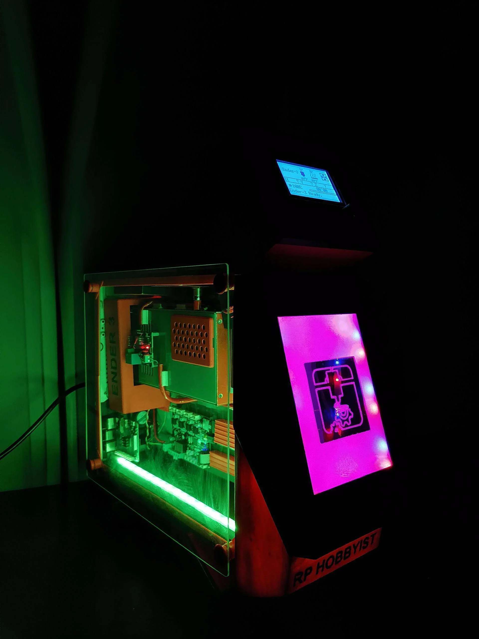 Ender 3 mainboard and electronics mounted inside an ATX PC case with RGB lighting and LCD control panel